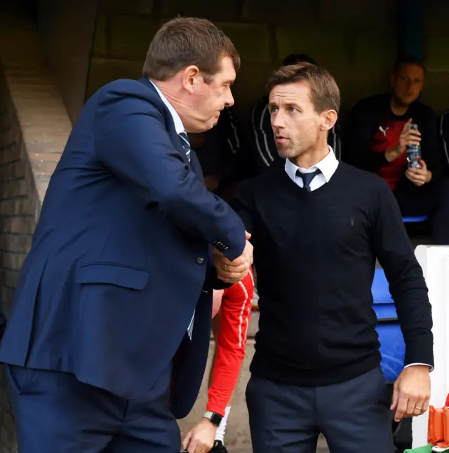 Tommy Wright and Neil McCann share a word before kick-off