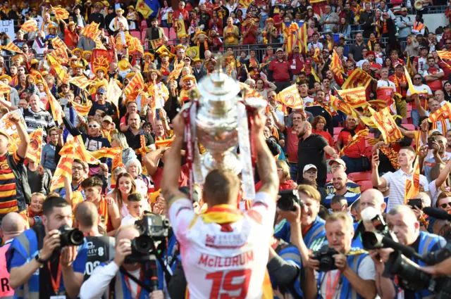 Michael McIlorum holds the Challenge Cup trophy