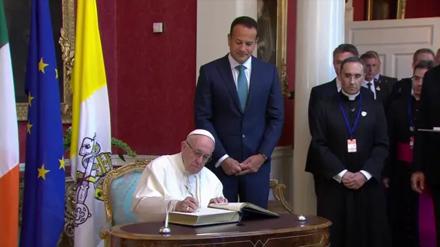 Pope Francis signs visitors book at Dublin Castle