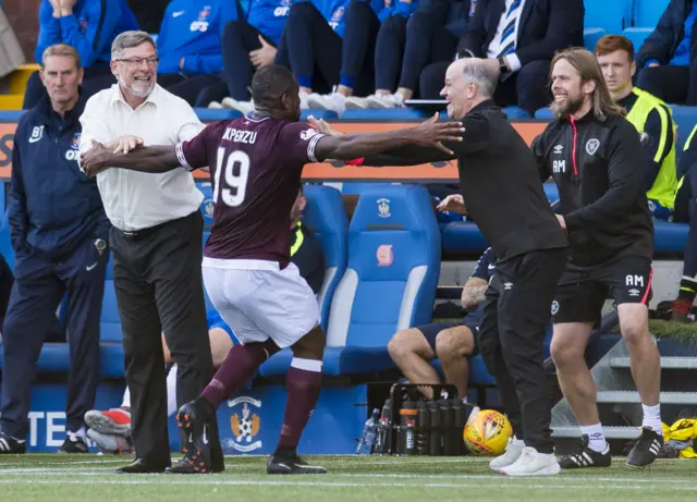 Uche Ikpeazu celebrates his winner for Hearts