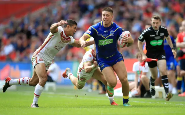 Warrington Wolves' Tome Lineham tackled