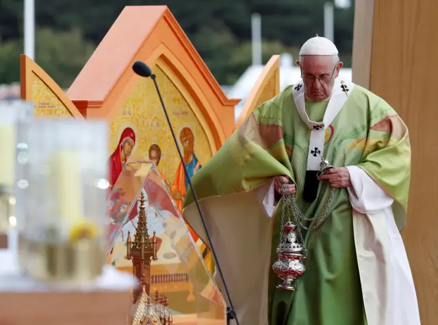 Pope Francis, pictured with the Thurible, in which incense is burned during worship services.