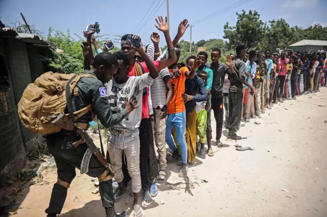 People being checked for weapons at Mogadishu stadium