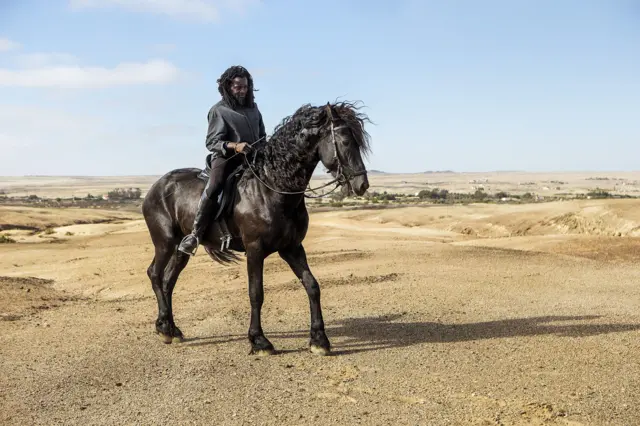 Man riding a horse at Swakopmund In Namibia