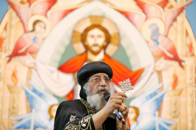 Coptic Pope Tawadros II recites a prayer in the new Cpotic church inside Eporo Tower on September 10, 2017 in Melbourne, Australia.