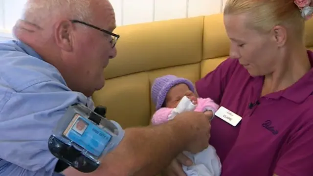 Claire and Roy with baby Evie