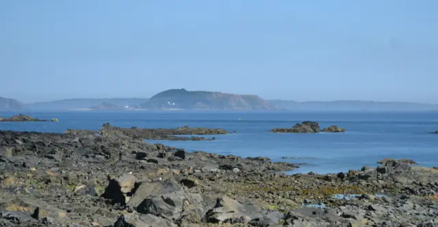 Smoke over Herm and Sark