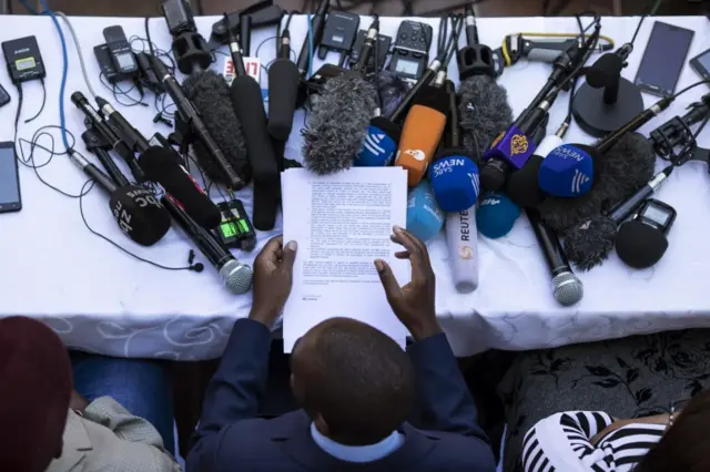 MDC leader Nelson Chamisa (C) holds a press conference on August 3, 2018 in Harare, Zimbabwe. Zimbabwe Electoral Commission (ZEC) officials last night announced the re-election of President Emmerson Mnangagwa of the ruling Zimbabwe African National Union - Patriotic Front (ZANU-PF). The election was the first since Robert Mugabe was ousted in a military coup last year, and featured a close race between Mnangagwa and opposition candidate Nelson Chamisa of the Movement for Democratic Change (MDC Alliance). Deadly clashes broke out earlier in the week following the release of parliamentary election results, amid allegations of fraud by Chamisa and MDC supporters.