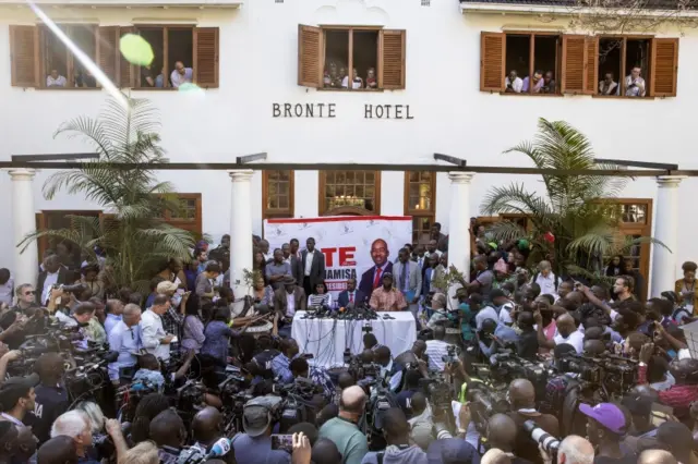 MDC leader Nelson Chamisa (C) holds a press conference on August 3, 2018 in Harare, Zimbabwe. Zimbabwe Electoral Commission (ZEC) officials last night announced the re-election of President Emmerson Mnangagwa of the ruling Zimbabwe African National Union - Patriotic Front (ZANU-PF). The election was the first since Robert Mugabe was ousted in a military coup last year, and featured a close race between Mnangagwa and opposition candidate Nelson Chamisa of the Movement for Democratic Change (MDC Alliance).