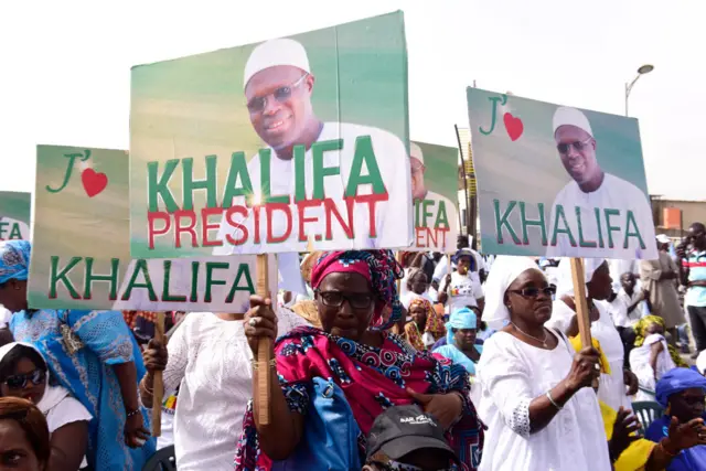 Supporters of Dakar mayor Khalifa Sall carry placards during a demonstration for his freedom from detention on May 19, 2017 in Dakar.