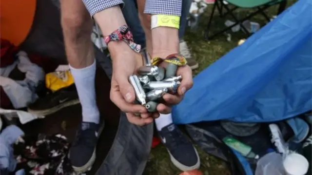 Laughing gas containers at a festival