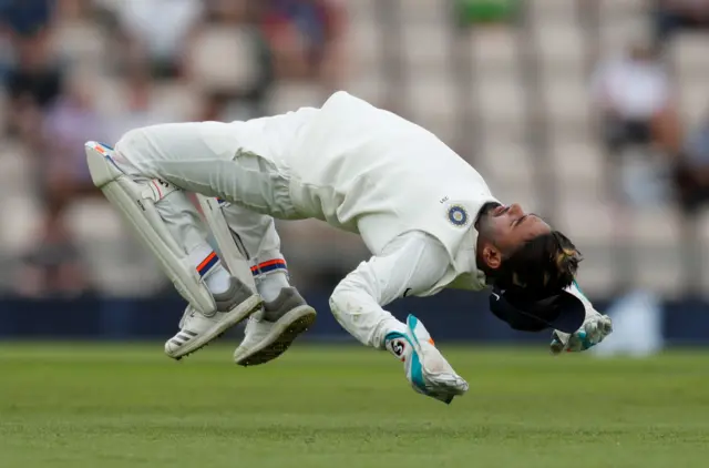 Rishabh Pant does a flip from the ground after a mis field