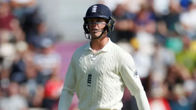 England's Keaton Jennings walks off after losing his wicket