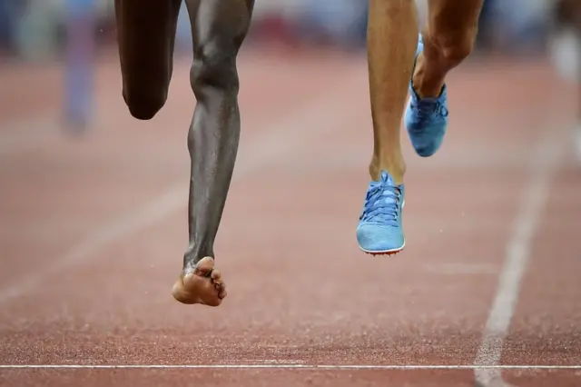 Close up showing athlete without his shoe