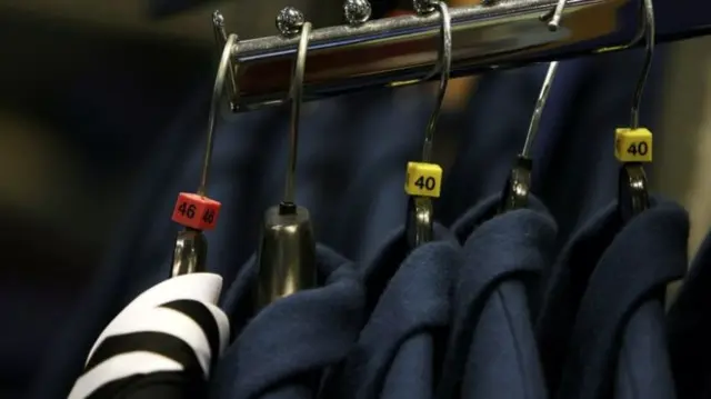 Uniforms on hangers