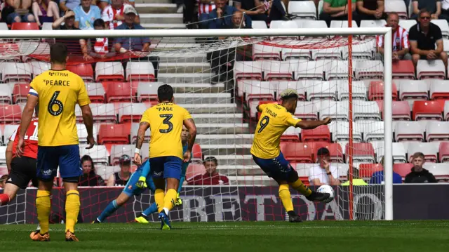 Lyle Taylor scores