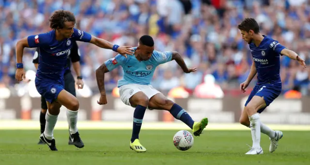 Gabriel Jesus in action with Chelsea's Jorginho and David Luiz