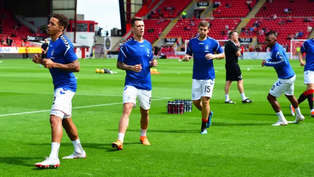 Rangers players warm-up at Pittodrie