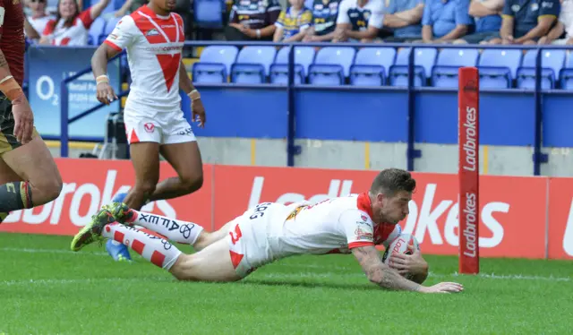 St Helens' Mark Percival scores his side's first try