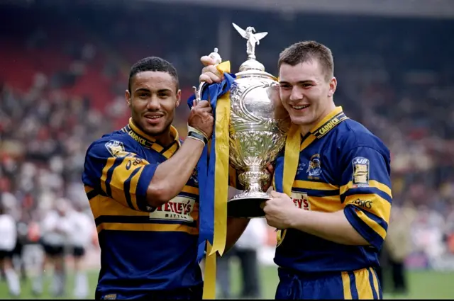 Leroy Rivett and Iestyn Harris (right) celebrate victory for the Leeds Rhinos in the 1999 Challenge Cup final