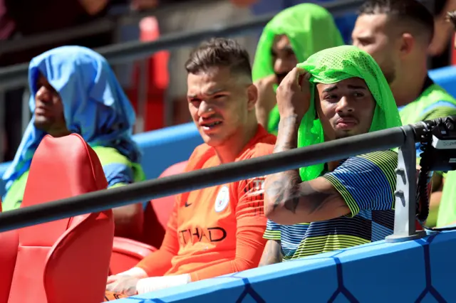 Gabriel Jesus shelters from the sun on the bench during the Community Shield match at Wembley Stadium