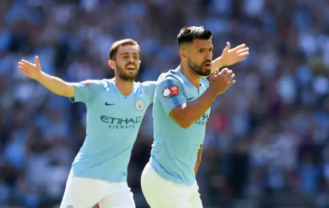 Sergio Aguero of Manchester City celebrates scoring his side"s first goal