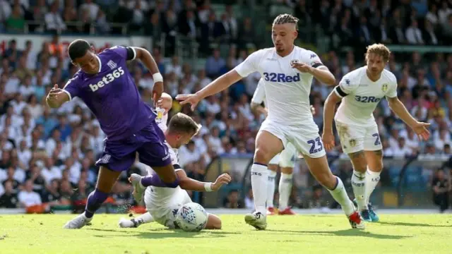 Stoke City"s Tom Ince (left) is fouled by Leeds United"s Barry Douglas (2nd left) during the Sky Bet Championship match at Elland Road