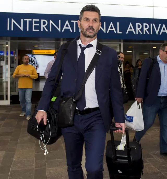 AEK Athens head coach Marinos Ouzounidis arrives at Glasgow Airport