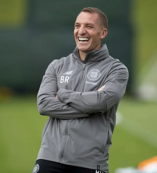 Celtic manager Brendan Rodgers shares a joke during training on Tuesday