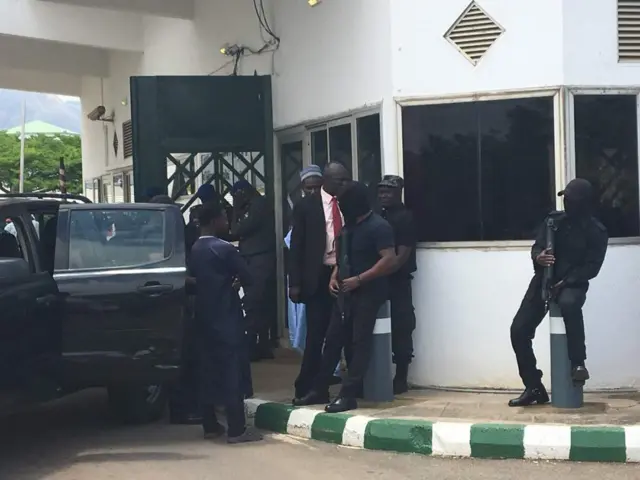 Security officers outside parliament