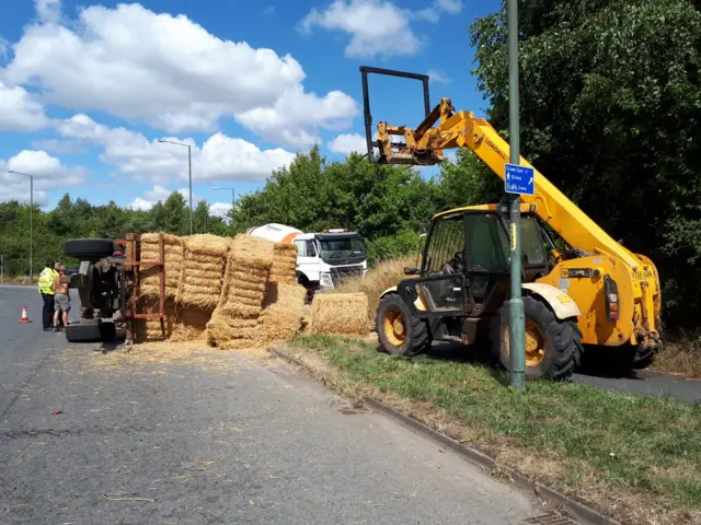 Hay trailer and cement lorry