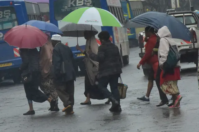 People with umbrellas