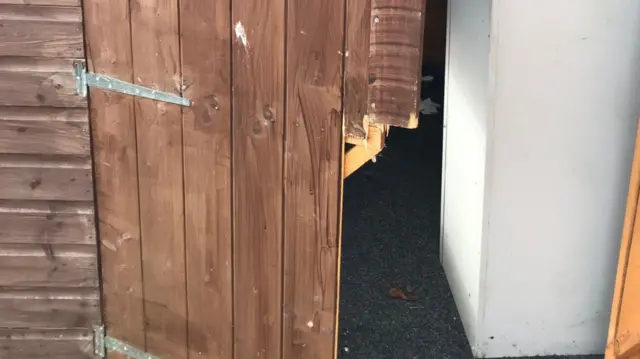 Broken door at Whitley Bridge Cricket Club