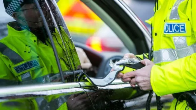 Breathalyser test carried out at roadside