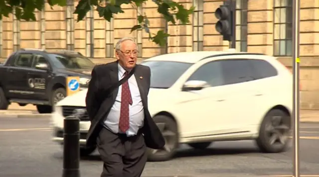 Terence Grigg walking into court.