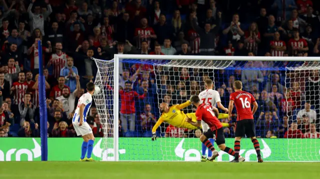 Charlie Austin scores for Southampton against Brighton