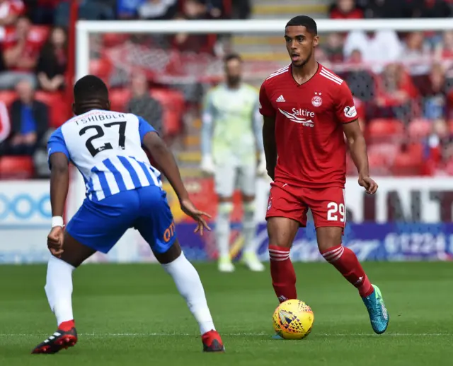 Aberdeen's Max Lowe (right) is making his Dons debut, while Aaron Tshibola is back in Kilmarnock colours