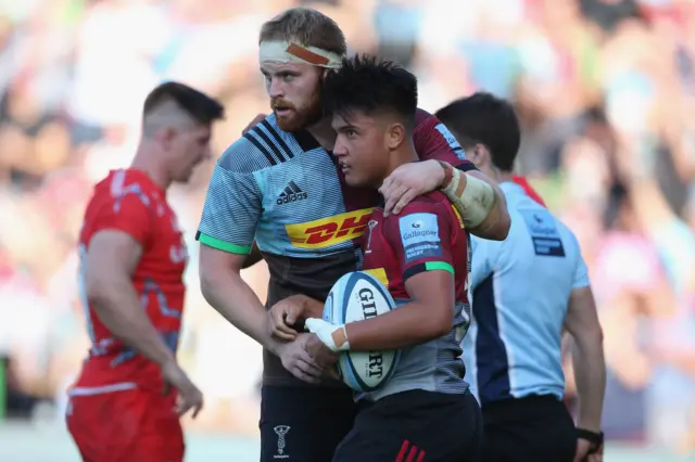 Harlequins celebrate a try