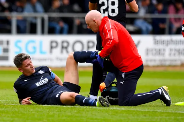 Josh Meekings lies injured