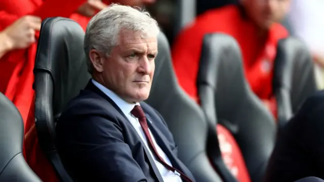 Mark Hughes watches on against Leicester