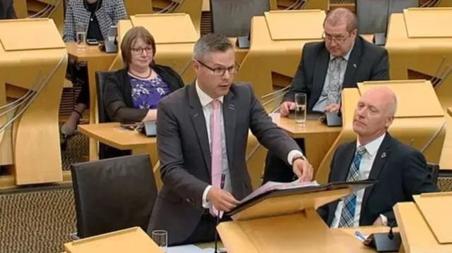 Derek Mackay said Westminster austerity was to blame for poor growth in Scotland