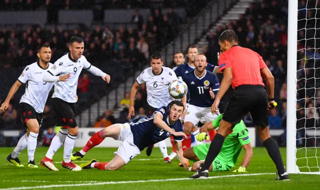 Scotland defender John Souttar is unable to direct the ball towards goal