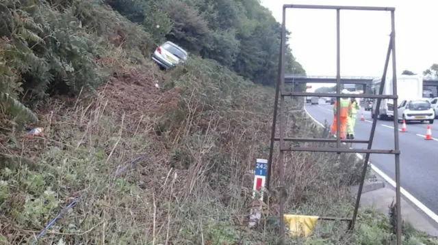 Car up embankment