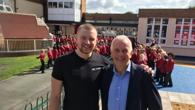 Adam Peaty with Ian Winter at the school