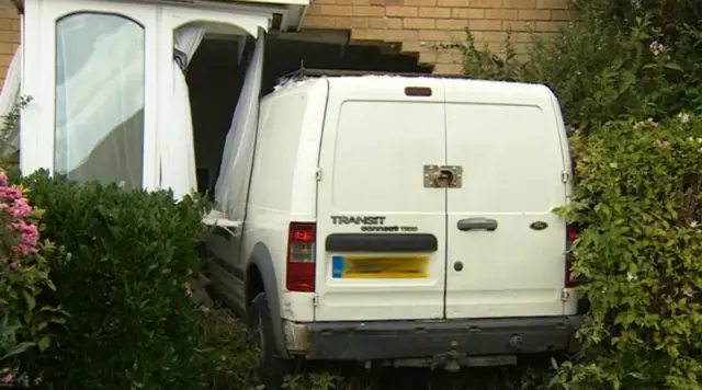 Van crashed into house