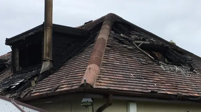 Damaged roof of bungalow