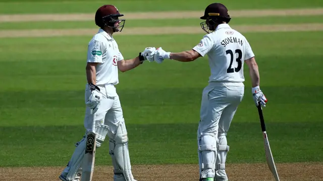 Surrey opening pair Rory Burns (left) and Mark Stoneman