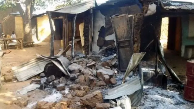 A burnt building in Zamfara state, Nigeria