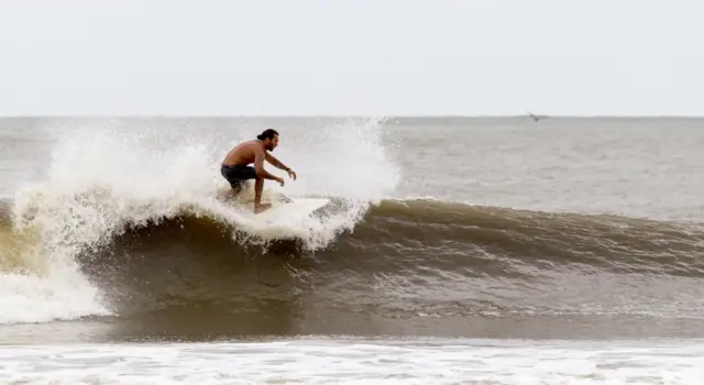 Surfer riding a wave