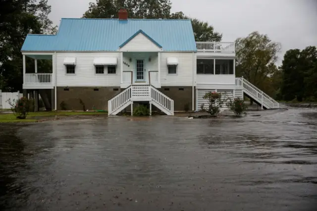 Water from Neuse River floods houses as Hurricane Florence comes ashore in New Bern, North Carolina.